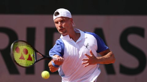 PARIS, FRANCE - MAY 25: Marton Fucsovics of Hungary plays a forehand during his Men's Singles first round match against Matteo Berrettini of Italy on Day Two of the 2026 French Open at Roland Garros on May 25, 2026 in Paris, France. (Photo by Matthew Stockman/Getty Images)