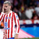 Atletico Madrid's French forward #07 Antoine Griezmann gets emotional next to one of his children during a farewell ceremony after the Spanish league football match between Club Atletico de Madrid and Girona FC at the Metroplitano stadium in Madrid on May 17, 2026. French forward Antoine Griezmann received a warm goodbye from the club's supporters today. Atletico's all-time top goalscorer will head to the United States to play for MLS side Orlando City.