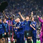 Inter Milan's French forward #9 Marcus Thuram and Inter Milan's Argentinian forward #10 Lautaro Martinez celebrate with teammates after winning the 21st 'scudetto' following the Italian Serie A football match between Inter Milan and Parma at San Siro stadium in Milan, on May 3, 2026.