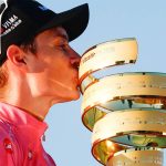 Team Visma Lease a Bike Danish rider Jonas Vingegaard wearing the overall leader's pink jersey kisses the trophy as he celebrates on the podium after winning the Giro d'Italia 2026 - Tour of Italy cycling race between Rome and Rome, Italy, on May 31, 2026.
