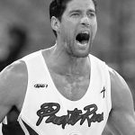 Jose Piculin Ortiz of Puerto Rico yells after making the winning basket against Angola 04 September 2002 in their second round game of the 2002 Men's FIBA World Basketball Championships at the RCA Dome in Indianapolis, IN. Puerto Rico won the game 89-87 in double over-time. AFP PHOTO/Jeff HAYNES