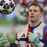 FILES) Bayern Munich's German goalkeeper #01 Manuel Neuer catches the ball during the warm up prior to the UEFA Champions League quarter-final second leg football match between FC Bayern Munich and Real Madrid in Munich, southern Germany, on April 15, 2026. Bayern Munich veteran Manuel Neuer announced on May 15, 2026 that he has extended his contract at the German champions by one year until 2027. The 40-year-old goalkeeper's deal was set to expire in the summer but he will stay on in Munich for what will be a 16th year at the Bavarian giants.