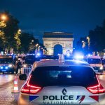 Police vans blocking the Champs Elysees as part of security measures ahead of the Champions League semifinal between PSG and Bayern a police car in the foreground in Paris, France, on May 6, 2026. Fourgons de police en travers de l avenue des Champs Elysees en dispositif de securite en marge de la demi finale de la ligue des Champions entre le PSG et le Bayern, une voiture de police en premier plan a Paris, France le 6 mai 2026.