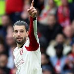 Liverpool's Hungarian midfielder #08 Dominik Szoboszlai celebrates scoring the team's first goal during the English Premier League football match between Manchester United and Liverpool at Old Trafford in Manchester, north west England, on May 3, 2026.