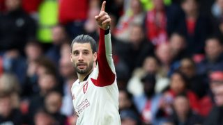 Liverpool's Hungarian midfielder #08 Dominik Szoboszlai celebrates scoring the team's first goal during the English Premier League football match between Manchester United and Liverpool at Old Trafford in Manchester, north west England, on May 3, 2026.