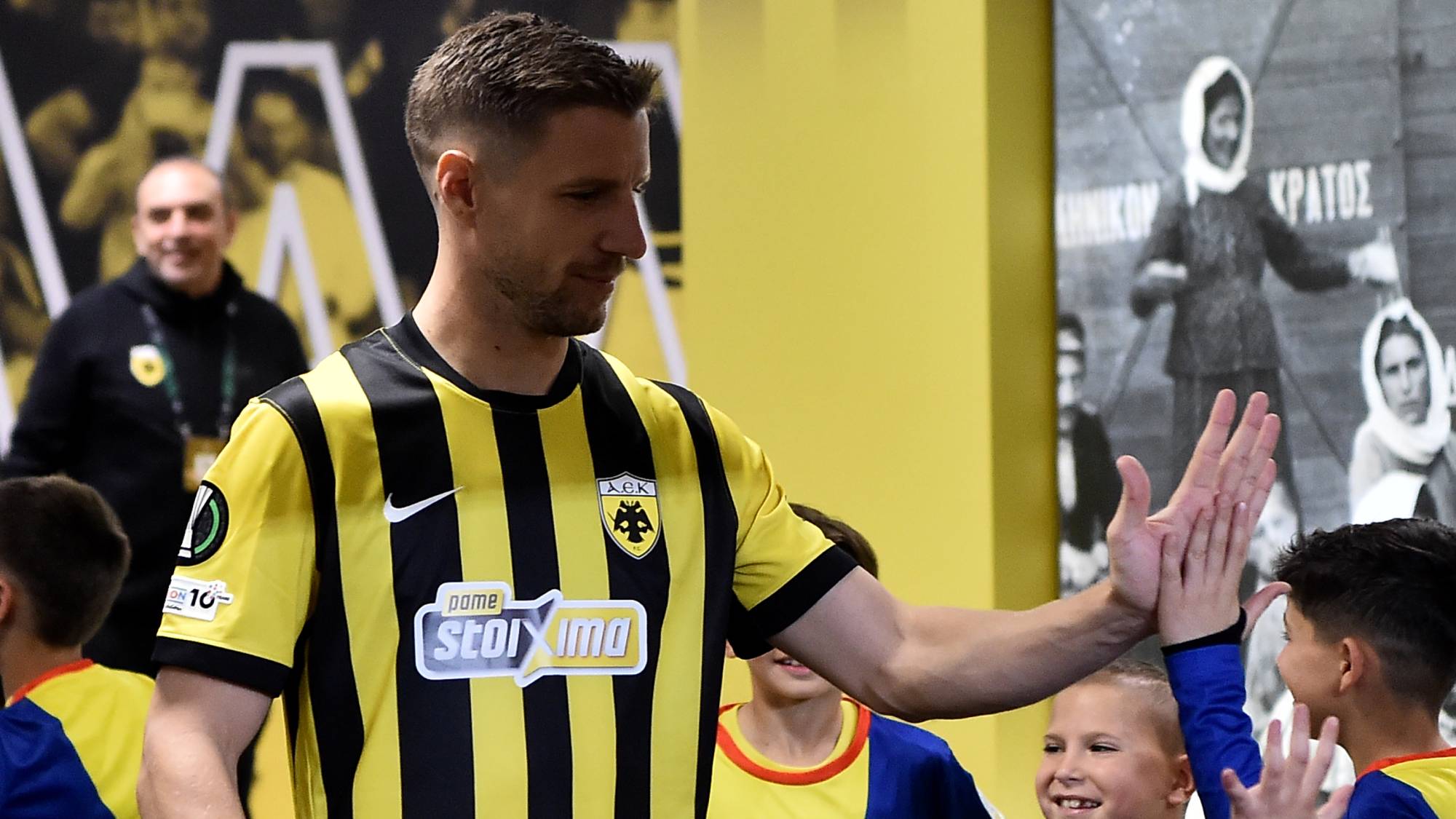 ATHENS, GREECE - APRIL 16: Barnabás Varga of AEK Athens high fives mascots in the tunnel prior to the UEFA Conference League 2025/26 Quarter-Final Leg Two match between PAE AEK and Rayo Vallecano de Madrid at Agia Sophia Stadium on April 16, 2026 in Athens, Greece. (Photo by Milos Bicanski - UEFA/UEFA via Getty Images)