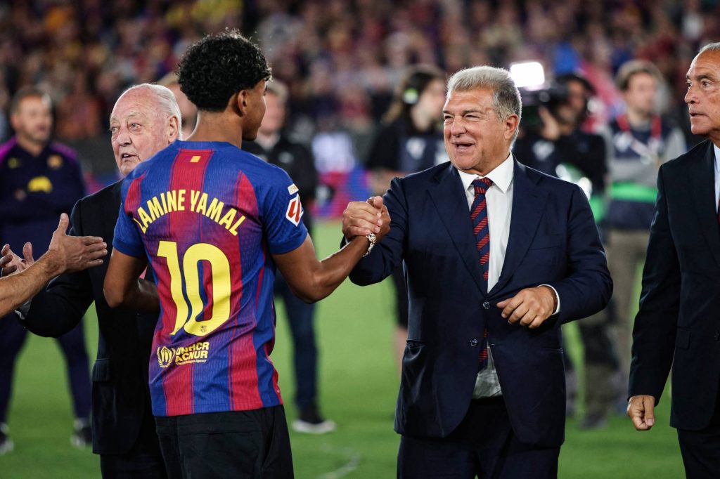 Lamine Yamal of FC Barcelona celebrates the La Liga championship with Joan Laporta, president of FC Barcelona, during the La Liga EA Sports 2025/26 ''El Clasico'' match between FC Barcelona and Real Madrid at Spotify Camp Nou Stadium in Barcelona, Spain, on May, 2026. (Photo by Gongora/NurPhoto)