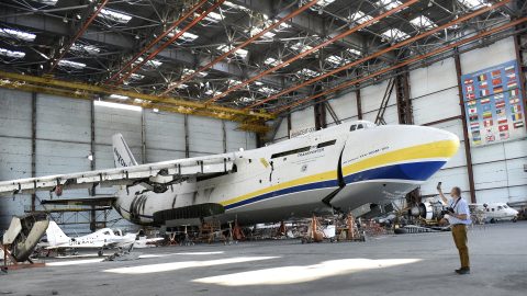 KYIV REGION, UKRAINE - AUGUST 30, 2022 - A damaged Antonov An-124-100-150 Ruslan cargo transporter is pictured on the premises of Antonov Airport, an international cargo airport that became the site of an intense battle during the 2022 Russian invasion of Ukraine, near Hostomel, Kyiv Region, northern Ukraine. NO USE RUSSIA. NO USE BELARUS. (Photo by Ruslan Kaniuka / NurPhoto via AFP)
