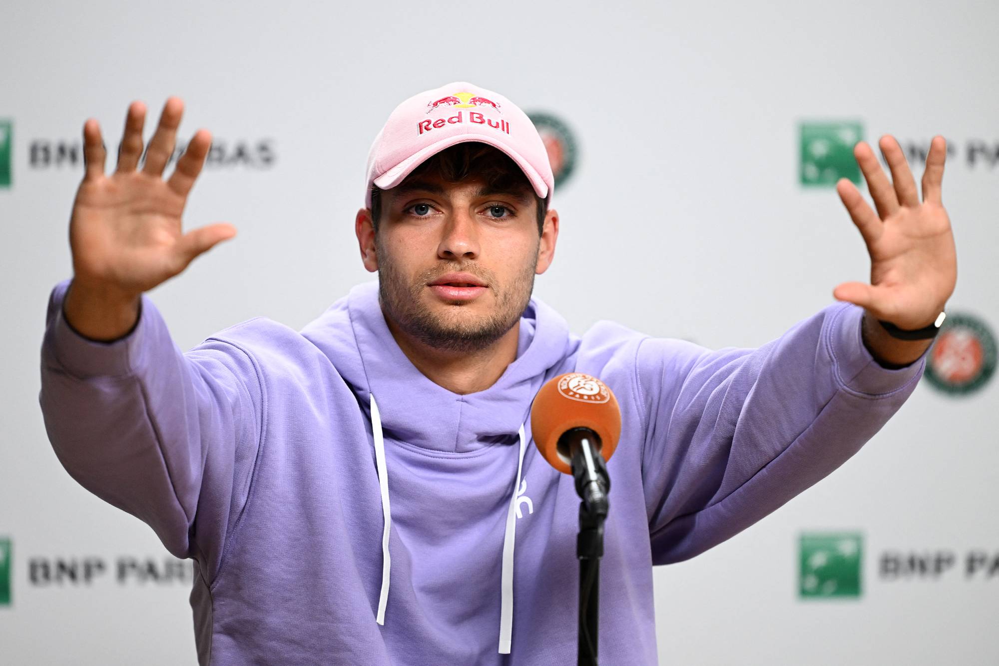 PARIS, FRANCE - JUNE 5: Matteo Arnaldi (not seen) of Italy and Flavio Cobolli of Italy attend a press conference after Matteo Arnaldi withdrew from their scheduled Men's Singles semifinal match due to health concerns on Day Thirteen of the 2026 French Open at Roland Garros on June 5, 2026 in Paris, France. Cobolli advanced to the finals to compete against Alexander Zverev. Burak Akbulut / Anadolu