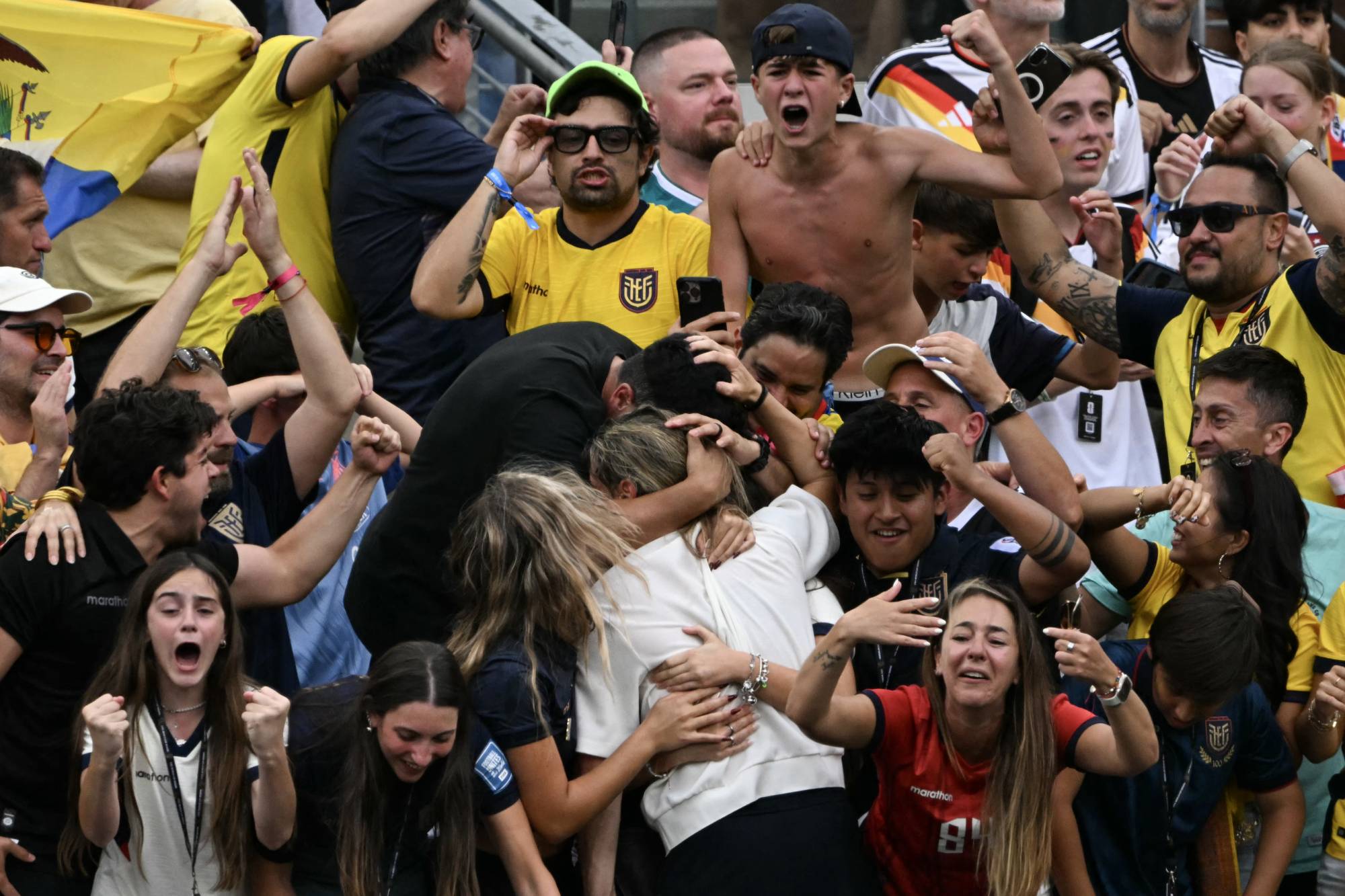 Ecuador's Argentine head coach Sebastian Beccacece celebrates with family and fans after winning the 2026 World Cup Group E football match between Ecuador and Germany at the New York/New Jersey Stadium in East Rutherford on June 25, 2026.