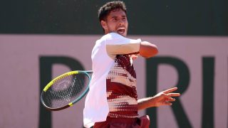 PARIS, FRANCE - MAY 26: Adolfo Daniel Vallejo of Paraguay plays a forehand against Cameron Norrie of the United Kingdom during the Men's Singles first round match during Day Three of the 2026 French Open at Roland Garros on May 26, 2026 in Paris, France. (Photo by Dan Istitene/Getty Images)