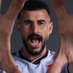 WHITE SULPHUR SPRINGS, WEST VIRGINIA - JUNE 12: (EXCLUSIVE COVERAGE) Aymen Hussein #18 of Iraq poses for a portrait during the official FIFA World Cup 2026 portrait session on June 12, 2026 in White Sulphur Springs, West Virginia. (Photo by Scott Taetsch - FIFA/FIFA via Getty Images)