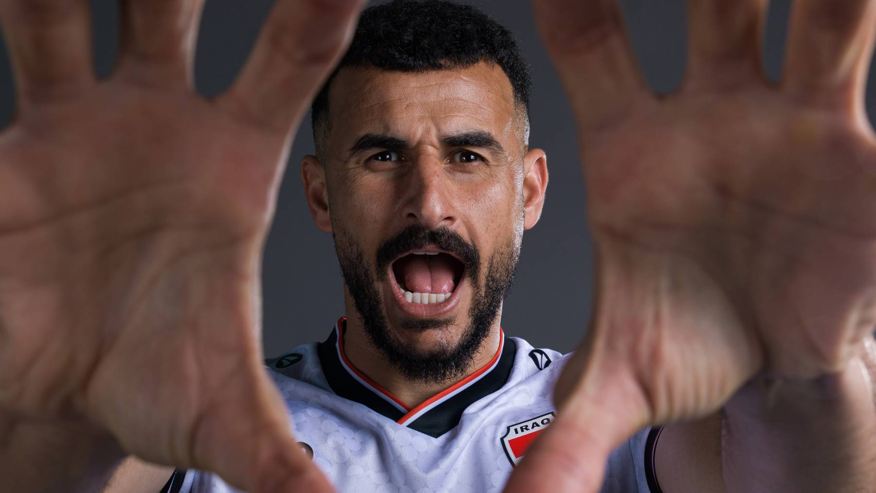 WHITE SULPHUR SPRINGS, WEST VIRGINIA - JUNE 12: (EXCLUSIVE COVERAGE) Aymen Hussein #18 of Iraq poses for a portrait during the official FIFA World Cup 2026 portrait session on June 12, 2026 in White Sulphur Springs, West Virginia. (Photo by Scott Taetsch - FIFA/FIFA via Getty Images)