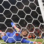 Netherlands goalkeeper #01 Bart Verbruggen concedes a penalty goal by Morocco forward #09 Soufiane Rahimi during the penalty shootout of the 2026 World Cup round of 32 football match between the Netherlands and Morocco at the Monterrey Stadium in Guadalupe on June 29, 2026.