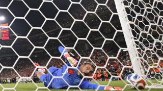 Netherlands goalkeeper #01 Bart Verbruggen concedes a penalty goal by Morocco forward #09 Soufiane Rahimi during the penalty shootout of the 2026 World Cup round of 32 football match between the Netherlands and Morocco at the Monterrey Stadium in Guadalupe on June 29, 2026.