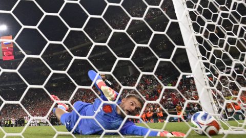 Netherlands goalkeeper #01 Bart Verbruggen concedes a penalty goal by Morocco forward #09 Soufiane Rahimi during the penalty shootout of the 2026 World Cup round of 32 football match between the Netherlands and Morocco at the Monterrey Stadium in Guadalupe on June 29, 2026.
