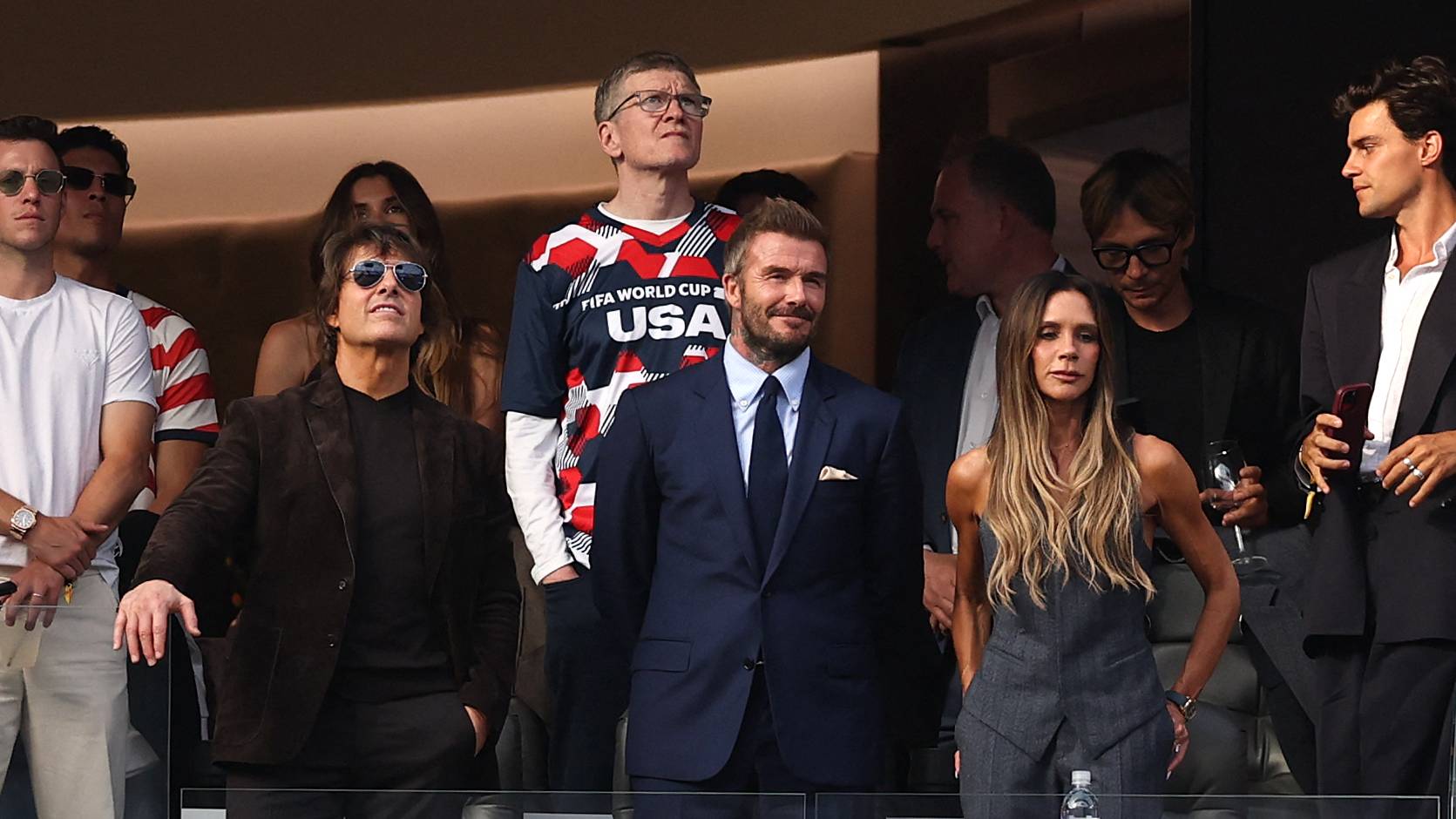 LOS ANGELES, CALIFORNIA - JUNE 12: Tom Cruise, David and Victoria Beckham pictured during the FIFA World Cup 2026 Group D match between USA and Paraguay at Los Angeles Stadium on June 12, 2026 in Los Angeles, California. Stu Forster/Getty Images/AFP