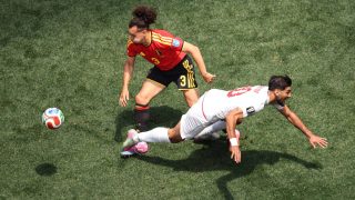 Belgium's defender #03 Arthur Theate and Iran's forward #20 Shahriyar Moghanloo fight for the ball during the 2026 World Cup Group G football match between Belgium and Iran at the Los Angeles Stadium in Inglewood on June 21, 2026.