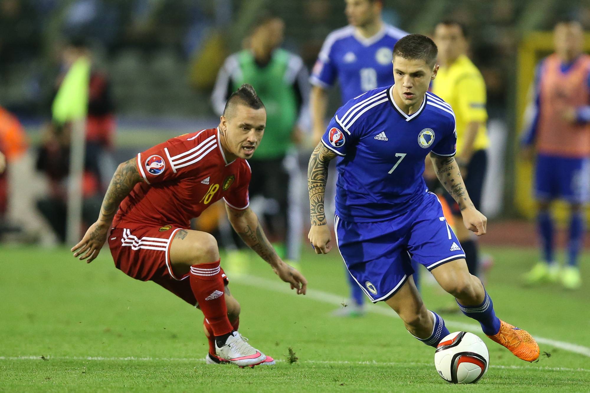 0150903 - BRUSSELS, BELGIUM: Belgium's Radja Nainggolan and Bosnian Muhamed Besic fight for the ball during a Euro 2016 qualification games between Belgian national soccer team Red Devils and Bosnia and Herzegovina, Thursday 03 September 2015, in Brussels King Baudouin stadium (Stade Roi Baudouin - Koning Boudewijnsatdion). BELGA PHOTO BRUNO FAHY Tuesday