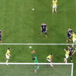 MIAMI GARDENS, FLORIDA - JUNE 24: (EDITOR'S NOTE: Image was captured using a remote camera positioned above the field of play.) Alisson #1 of Brazil makes a save during the FIFA World Cup 2026 Group C match between Scotland and Brazil at Miami Stadium on June 24, 2026 in Miami, United States. Megan Briggs/Getty Images/AFP