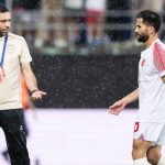 Jordan's Moroccan head coach Jamal Sellami speaks with Jordan's defender #28 Anas Badawi during a friendly match between Switzerland and Jordan ahead of the 2026 FIFA World Cup football tournament at the Kybunpark stadium, in St. Gallen on May 31, 2026.