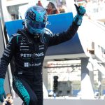 Mercedes' British driver George Russell celebrates pole position after the qualifying session at the Circuit de Catalunya ahead of the Catalonia Formula One Grand Prix in Montmelo, on the outskirts of Barcelona, on June 13, 2026.