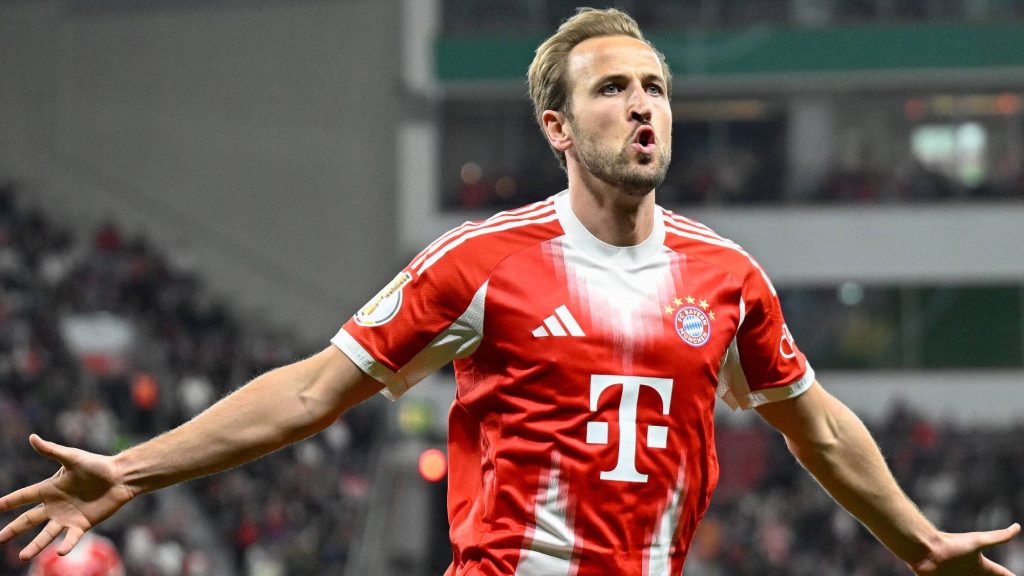 Bayern Munich's English forward #09 Harry Kane celebrates scoring the opening goal during the German Cup (DFB-Pokal) semi-final football match between Bayer 04 Leverkusen and FC Bayern Munich in Leverkusen, western Germany on April 22, 2026.