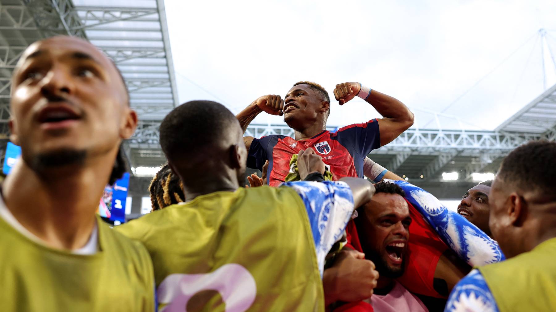 MIAMI GARDENS, FLORIDA - JUNE 21: Helio Varela #26 of Cabo Verde celebrates with teammates after scoring the team's second goal during the FIFA World Cup 2026 Group H match between Uruguay and Cabo Verde at Miami Stadium on June 21, 2026 in Miami Gardens, Florida. Alex Slitz/Getty Images/AFP