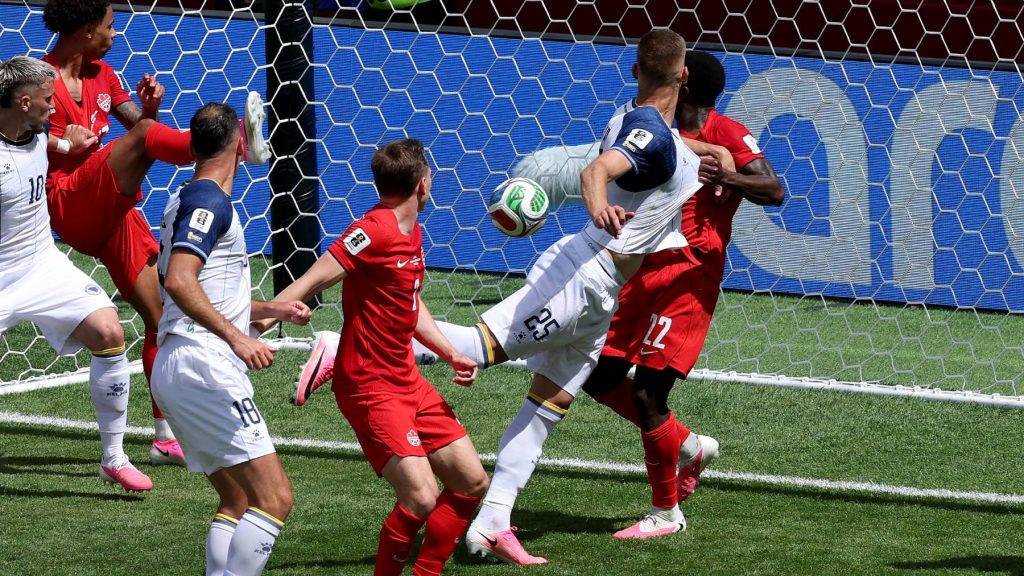 TORONTO, ONTARIO - JUNE 12: Jovo Lukic #25 of Bosnia and Herzegovina scores his team's first goal off a header during the FIFA World Cup 2026 Group B match between Canada and Bosnia and Herzegovina at Toronto Stadium on June 12, 2026 in Toronto, Ontario. Michael Steele/Getty Images/AFP
