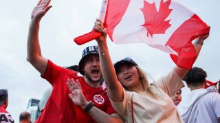 Canadian fans attend the 2026 FIFA World Cup Fan Festival to support their own team for the match between Canada and Qatar at Fort York Blvd. on June 19, 2026 in Toronto, Canada.
