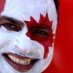 TORONTO, ONTARIO - JUNE 12: Detail of a face tattoo as a fan arrives ahead of the FIFA World Cup 2026 Group B match between Canada and Bosnia and Herzegovina at Toronto Stadium on June 12, 2026 in Toronto, Ontario. Michael Steele/Getty Images/AFP