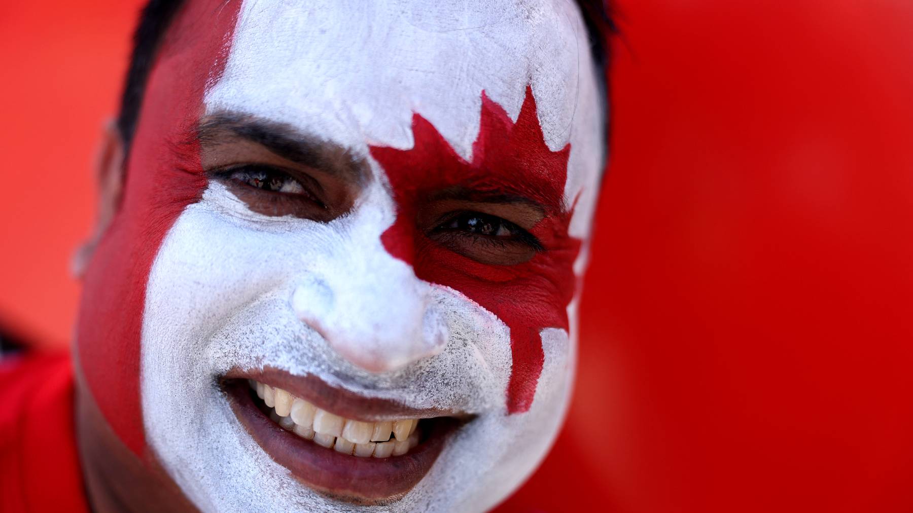 TORONTO, ONTARIO - JUNE 12: Detail of a face tattoo as a fan arrives ahead of the FIFA World Cup 2026 Group B match between Canada and Bosnia and Herzegovina at Toronto Stadium on June 12, 2026 in Toronto, Ontario. Michael Steele/Getty Images/AFP