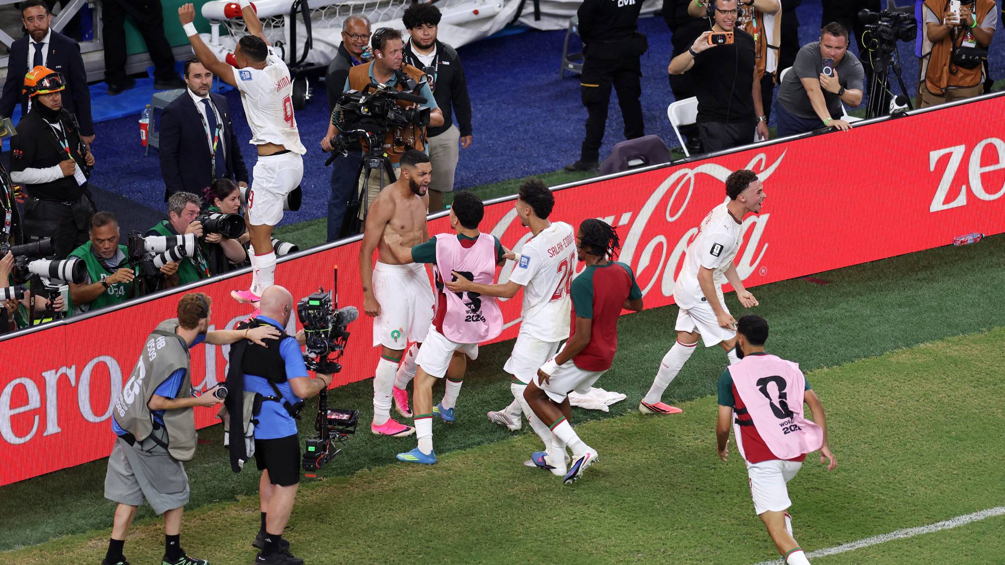 Morocco's players celebrate after winning in the shootout during the 2026 World Cup round of 32 football match between the Netherlands and Morocco at the Monterrey Stadium in Guadalupe on June 29, 2026.