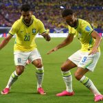 MIAMI GARDENS, FLORIDA - JUNE 24: Matheus Cunha #9 of Brazil celebrates with Lucas Paqueta #20 after scoring the team's third goal during the FIFA World Cup 2026 Group C match between Scotland and Brazil at Miami Stadium on June 24, 2026 in Miami Gardens, Florida. Robert Cianflone/Getty Images/AFP