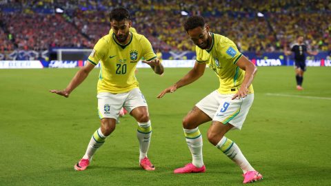 MIAMI GARDENS, FLORIDA - JUNE 24: Matheus Cunha #9 of Brazil celebrates with Lucas Paqueta #20 after scoring the team's third goal during the FIFA World Cup 2026 Group C match between Scotland and Brazil at Miami Stadium on June 24, 2026 in Miami Gardens, Florida. Robert Cianflone/Getty Images/AFP