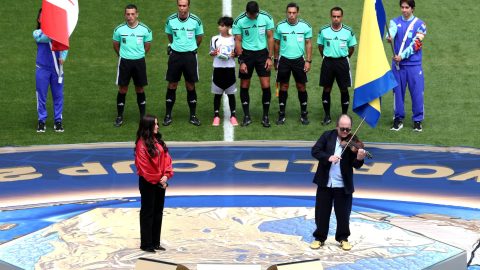 TORONTO, ONTARIO - JUNE 12: Alanis Morissette (L) performs the Canadian national anthem before the FIFA World Cup 2026 Group B match between Canada and Bosnia and Herzegovina at Toronto Stadium on June 12, 2026 in Toronto, Ontario. (Photo by Ezra Shaw - FIFA/FIFA via Getty Images)