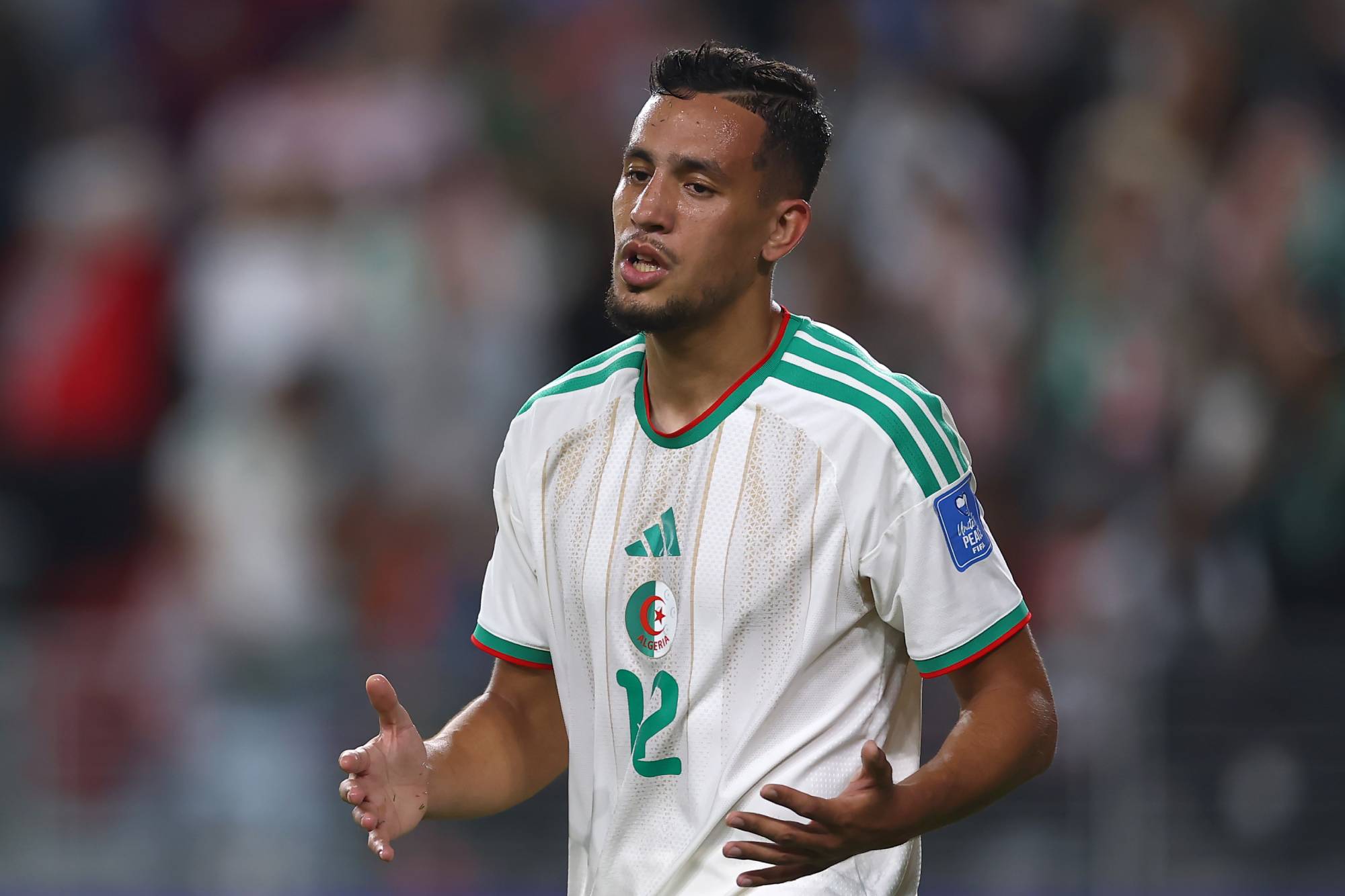 SANTA CLARA, CALIFORNIA - JUNE 22: Nadhir Benbouali #12 of Algeria reacts after the 2-1 win during the FIFA World Cup 2026 Group J match between Jordan and Algeria at San Francisco Bay Area Stadium on June 22, 2026 in Santa Clara, California. (Photo by Dean Mouhtaropoulos - FIFA/FIFA via Getty Images)