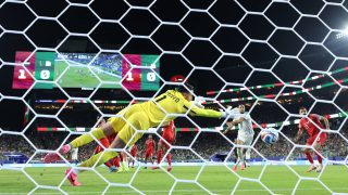 SANTA CLARA, CALIFORNIA - JUNE 22: (EDITOR'S NOTE: Image was captured using a remote camera from behind the goal.) Nadhir Benbouali #12 of Algeria scores his team's first goal past Yazeed Abulaila #1 of Jordan during the FIFA World Cup 2026 Group J match between Jordan and Algeria at San Francisco Bay Area Stadium on June 22, 2026 in Santa Clara, California. (Photo by Stu Forster/Getty Images)