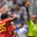 LOS ANGELES, CALIFORNIA - JUNE 21: Referee Dari­o Herrera shows red card to Nathan Ngoy of Belgium during the 2026 FIFA World Cup First Stage Group G match between IR Iran and Belgium at the Los Angeles Stadium (SoFi Stadium) in Inglewood, California, United States on June 21, 2026. Tayfun Coskun / Anadolu