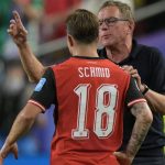 Austria's coach Ralf Rangnick speaks to Austria's midfielder #18 Romano Schmid during the 2026 World Cup Group J football match between Algeria and Austria at the Kansas City Stadium in Kansas City on June 27, 2026.