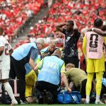 VANCOUVER, BRITISH COLUMBIA - JUNE 18: Ismael Kone #8 of Canada receives the medical attention after being fouled by Assim Madibo #23 of Qatar during the FIFA World Cup 2026 Group B match between Canada and Qatar at BC Place Vancouver on June 18, 2026 in Vancouver, British Columbia. Alex Grimm/Getty Images/AFP
