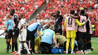 VANCOUVER, BRITISH COLUMBIA - JUNE 18: Ismael Kone #8 of Canada receives the medical attention after being fouled by Assim Madibo #23 of Qatar during the FIFA World Cup 2026 Group B match between Canada and Qatar at BC Place Vancouver on June 18, 2026 in Vancouver, British Columbia. Alex Grimm/Getty Images/AFP
