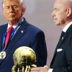 WASHINGTON, DC - DECEMBER 05: U.S. President Donald Trump receives the FIFA Peace Prize from Gianni Infantino, President of FIFA, during the FIFA World Cup 2026 Official Draw at John F. Kennedy Center for the Performing Arts on December 05, 2025 in Washington, DC. (Photo by Jia Haocheng - Pool/Getty Images)