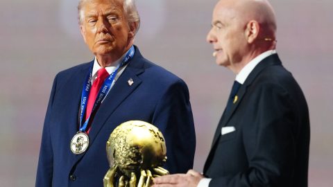 WASHINGTON, DC - DECEMBER 05: U.S. President Donald Trump receives the FIFA Peace Prize from Gianni Infantino, President of FIFA, during the FIFA World Cup 2026 Official Draw at John F. Kennedy Center for the Performing Arts on December 05, 2025 in Washington, DC. (Photo by Jia Haocheng - Pool/Getty Images)