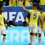 Brazil's forward #07 Vinicius Junior celebrates with teammates after scoring his team's first goal during the 2026 World Cup Group C football match between Scotland and Brazil at the Miami Stadium in Miami Gardens on June 24, 2026.