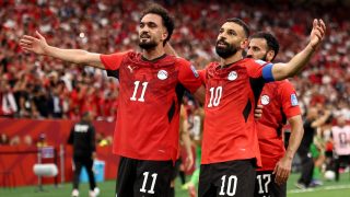 VANCOUVER, BRITISH COLUMBIA - JUNE 21: Mohamed Salah #10 of Egypt celebrates with Mostafa Zico #11 after scoring the team's second goal during the FIFA World Cup 2026 Group G match between New Zealand and Egypt at BC Place Vancouver on June 21, 2026 in Vancouver, British Columbia. Fran Santiago/Getty Images/AFP