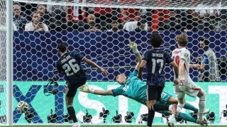 England's forward #18 Anthony Gordon shoots and scores his team's first goal during the 2026 World Cup football tournament semi-final match between England and Argentina at the Atlanta Stadium in Atlanta on July 15, 2026.