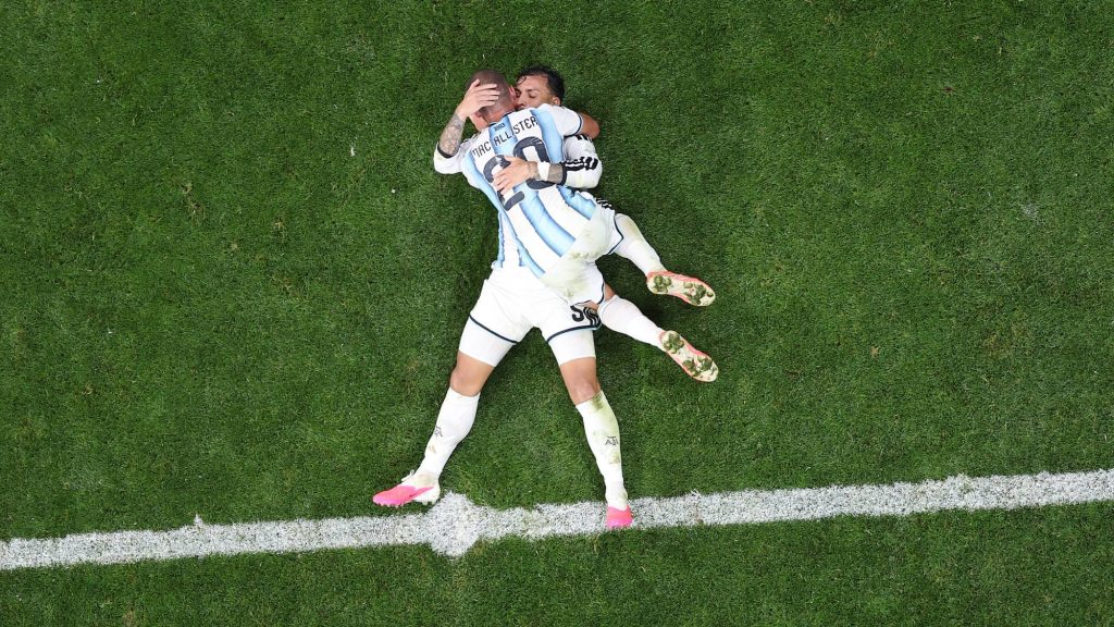 ATLANTA, GEORGIA - JULY 07: Alexis Mac Allister #20 and Leandro Paredes #5 of Argentina celebrate the team's third goal scored by Enzo Fernandez #24 (not pictured) during the FIFA World Cup 2026 Round of 16 match between Argentina and Egypt at Atlanta Stadium on July 07, 2026 in Atlanta, Georgia. Dan Mullan/Getty Images/AFP