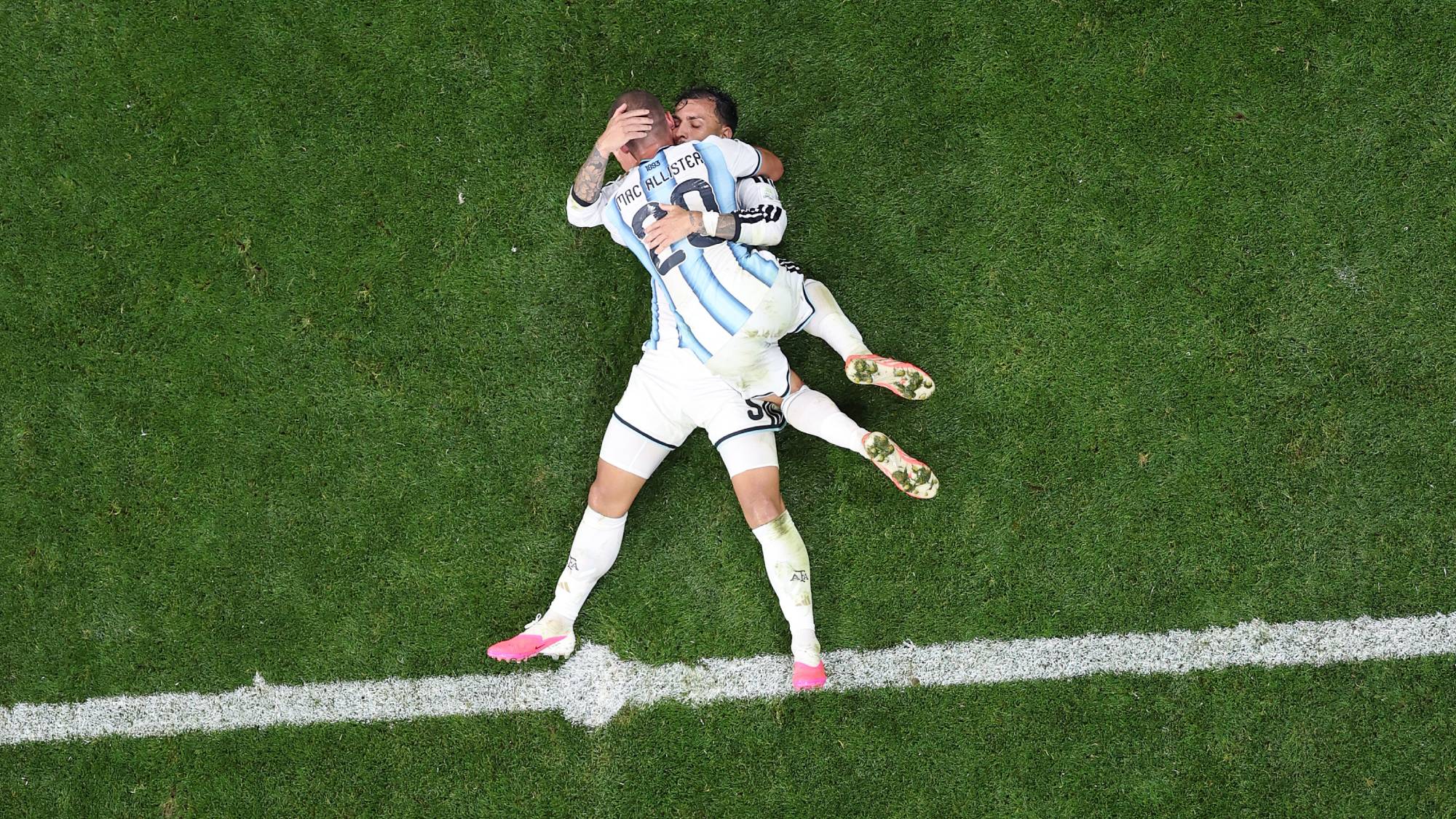 ATLANTA, GEORGIA - JULY 07: Alexis Mac Allister #20 and Leandro Paredes #5 of Argentina celebrate the team's third goal scored by Enzo Fernandez #24 (not pictured) during the FIFA World Cup 2026 Round of 16 match between Argentina and Egypt at Atlanta Stadium on July 07, 2026 in Atlanta, Georgia. Dan Mullan/Getty Images/AFP