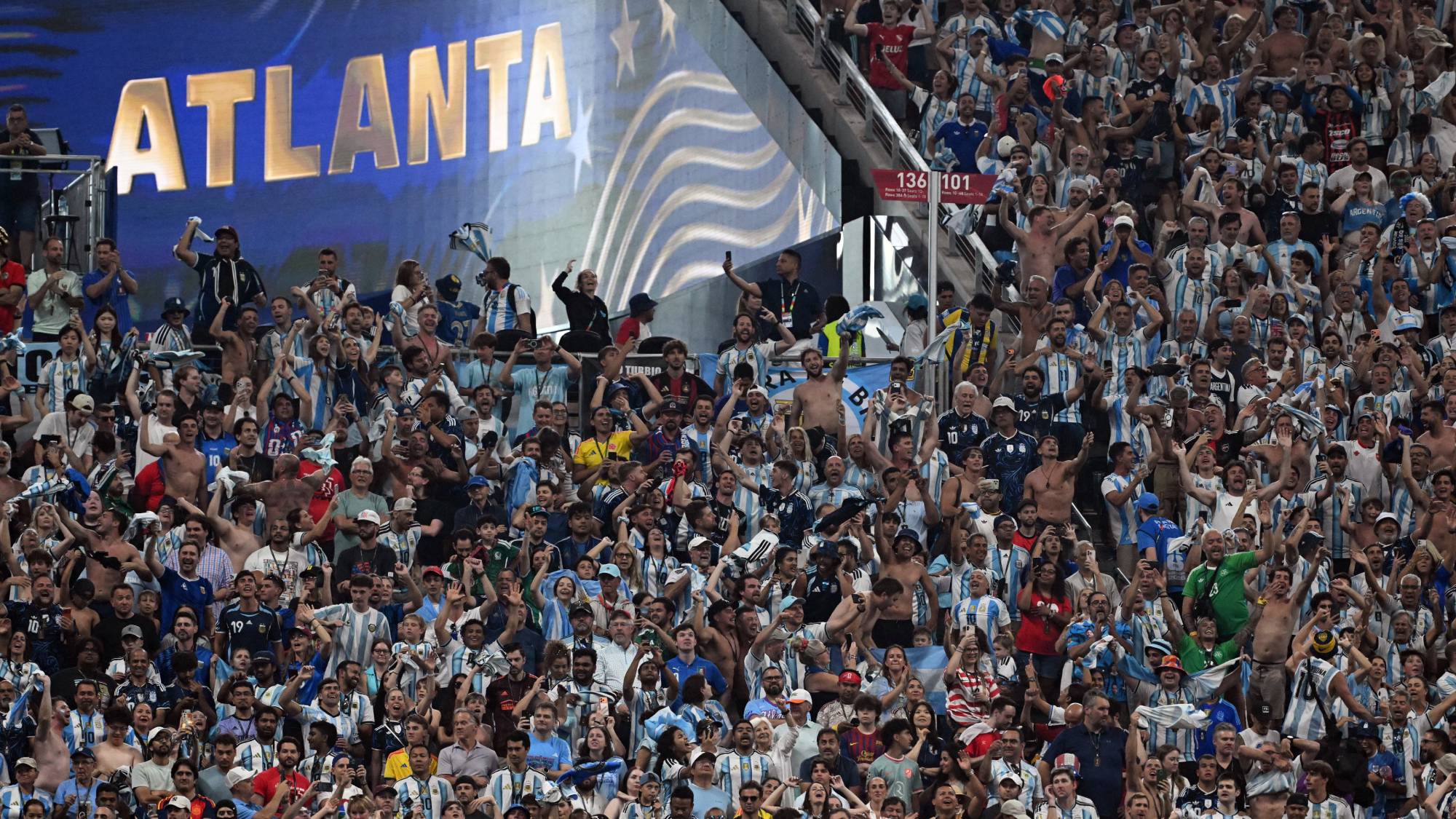 Argentina's fans celebrates at the end of the 2026 World Cup round of 16 football match between Argentina and Egypt at Atlanta Stadium in Atlanta on July 7, 2026.
